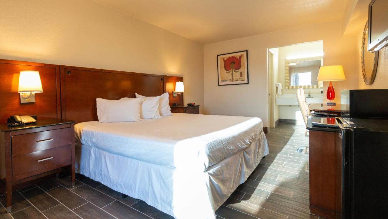 Magnuson Extended Stay And Suites Airport Hotel Irving Exterior photo